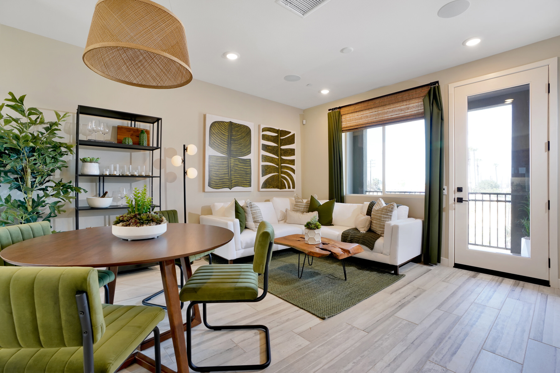 Dining/Living/Balcony in Plan 1 at Moneta Pointe by Melia Homes in Gardena, CA