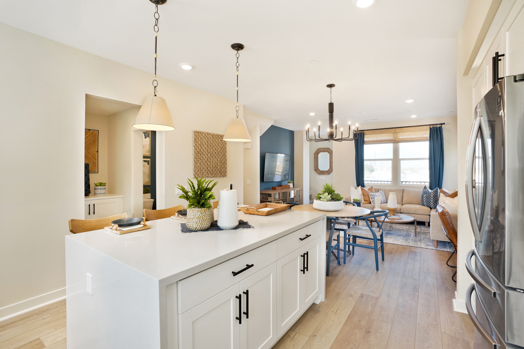 Kitchen/Dining/Living in Plan 2 at Moneta Pointe by Melia Homes in Gardena, CA