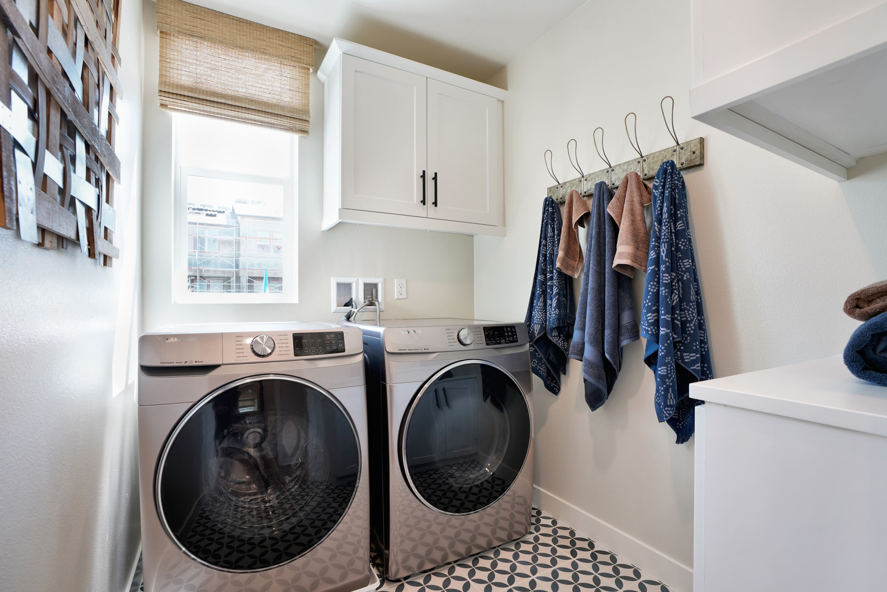 Laundry in Plan 2 at Moneta Pointe by Melia Homes in Gardena, CA