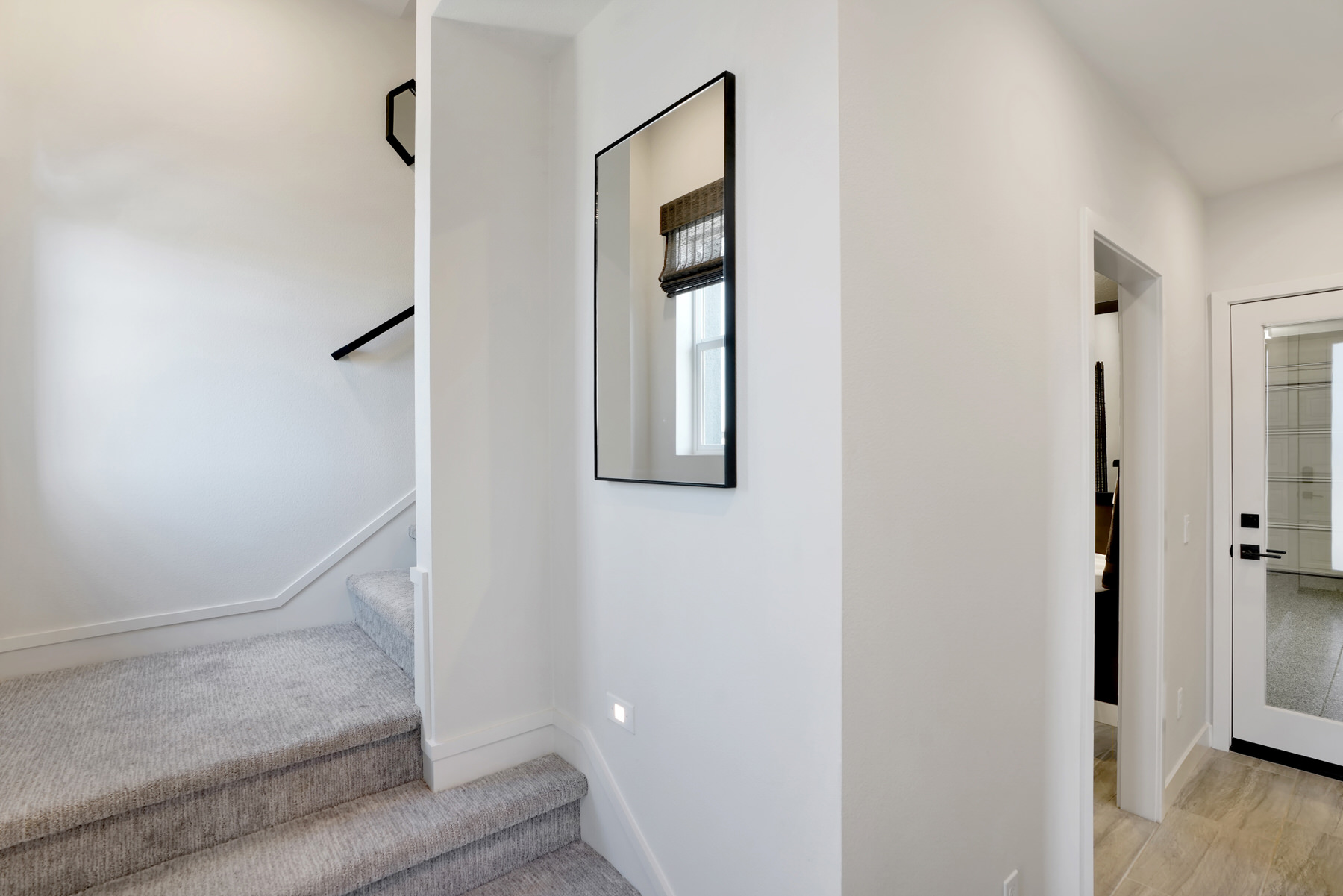 Stairs/Entry in Plan 3 at Moneta Pointe by Melia Homes in Gardena, CA
