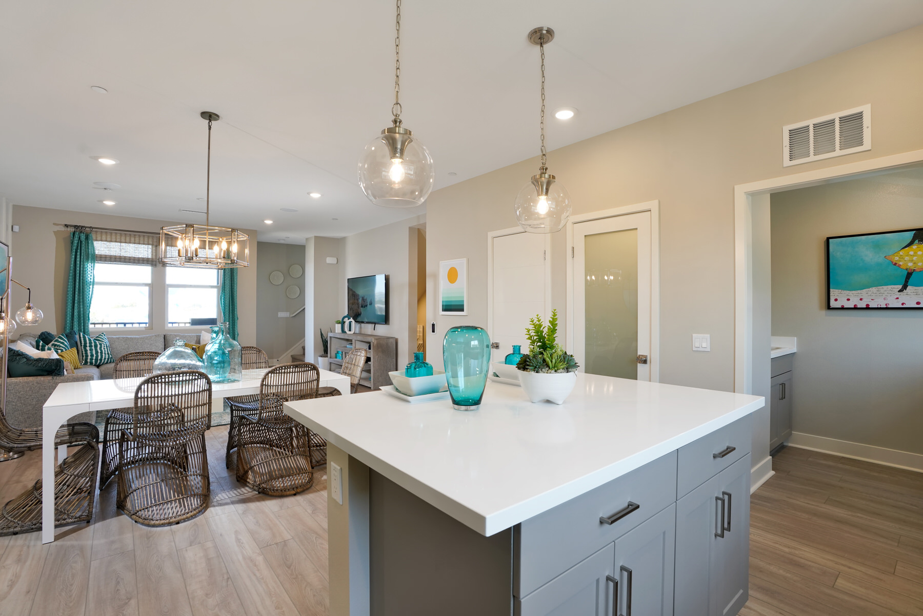 Kitchen/Dining/Living in Plan 4 at Moneta Pointe by Melia Homes in Gardena, CA