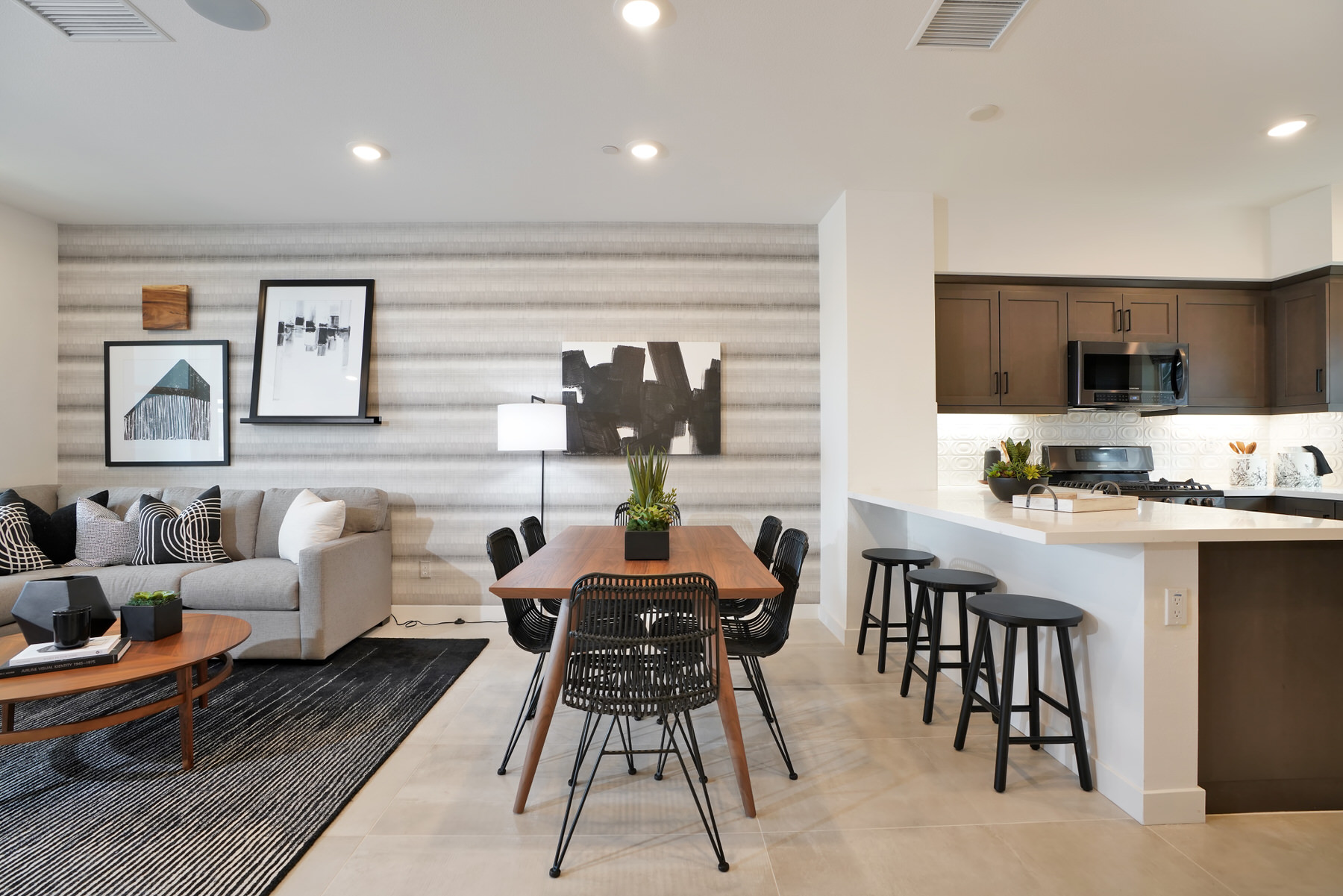 Living/Dining/Kitchen in Plan 1 at Townes at Magnolia by Melia Homes in Anaheim, CA