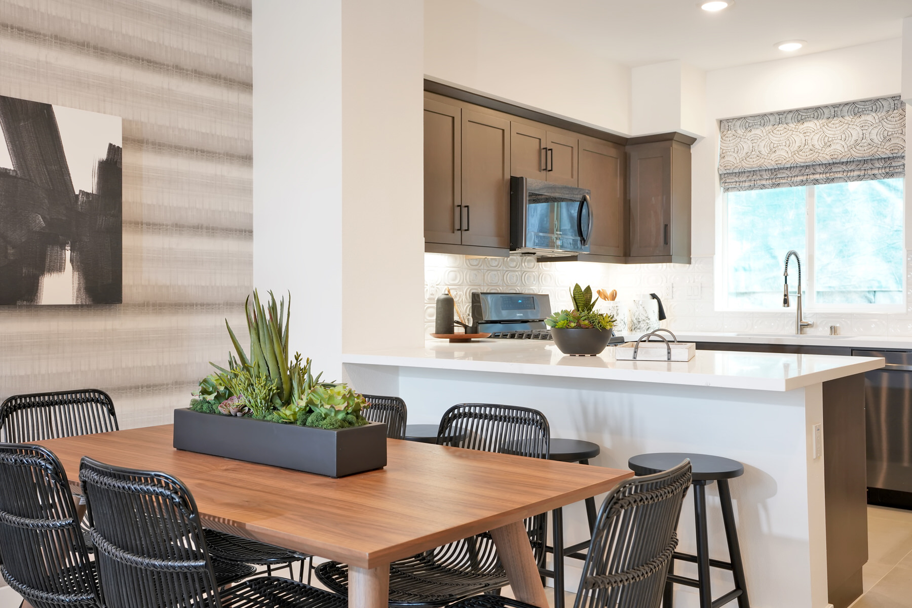 Dining/Kitchen in Plan 1 at Townes at Magnolia by Melia Homes in Anaheim, CA