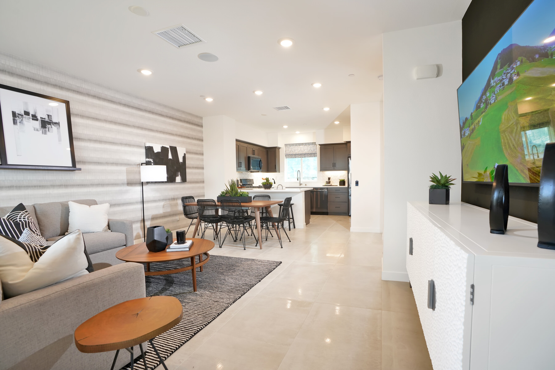 Living/Dining/Kitchen in Plan 1 at Townes at Magnolia by Melia Homes in Anaheim, CA