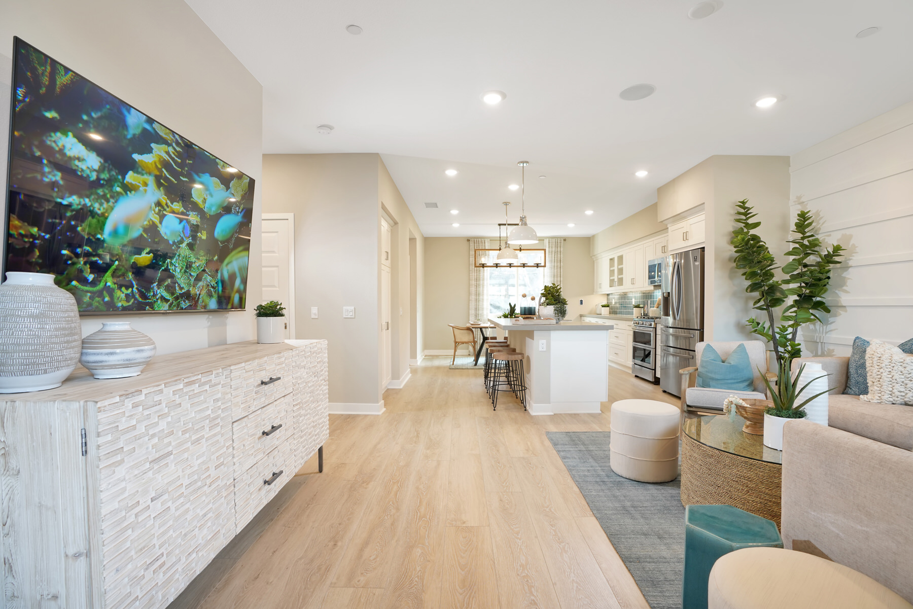 Living/Kitchen/Dining in Plan 2 at Townes at Magnolia by Melia Homes in Anaheim, CA