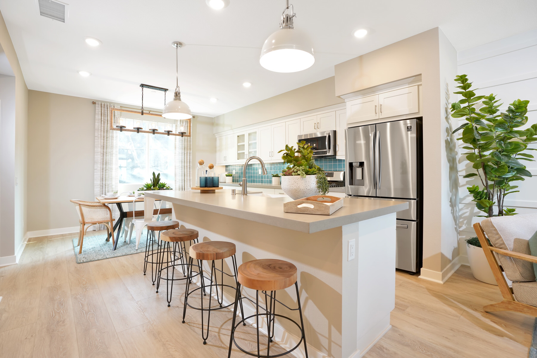 Kitchen/Dining in Plan 2 at Townes at Magnolia by Melia Homes in Anaheim, CA