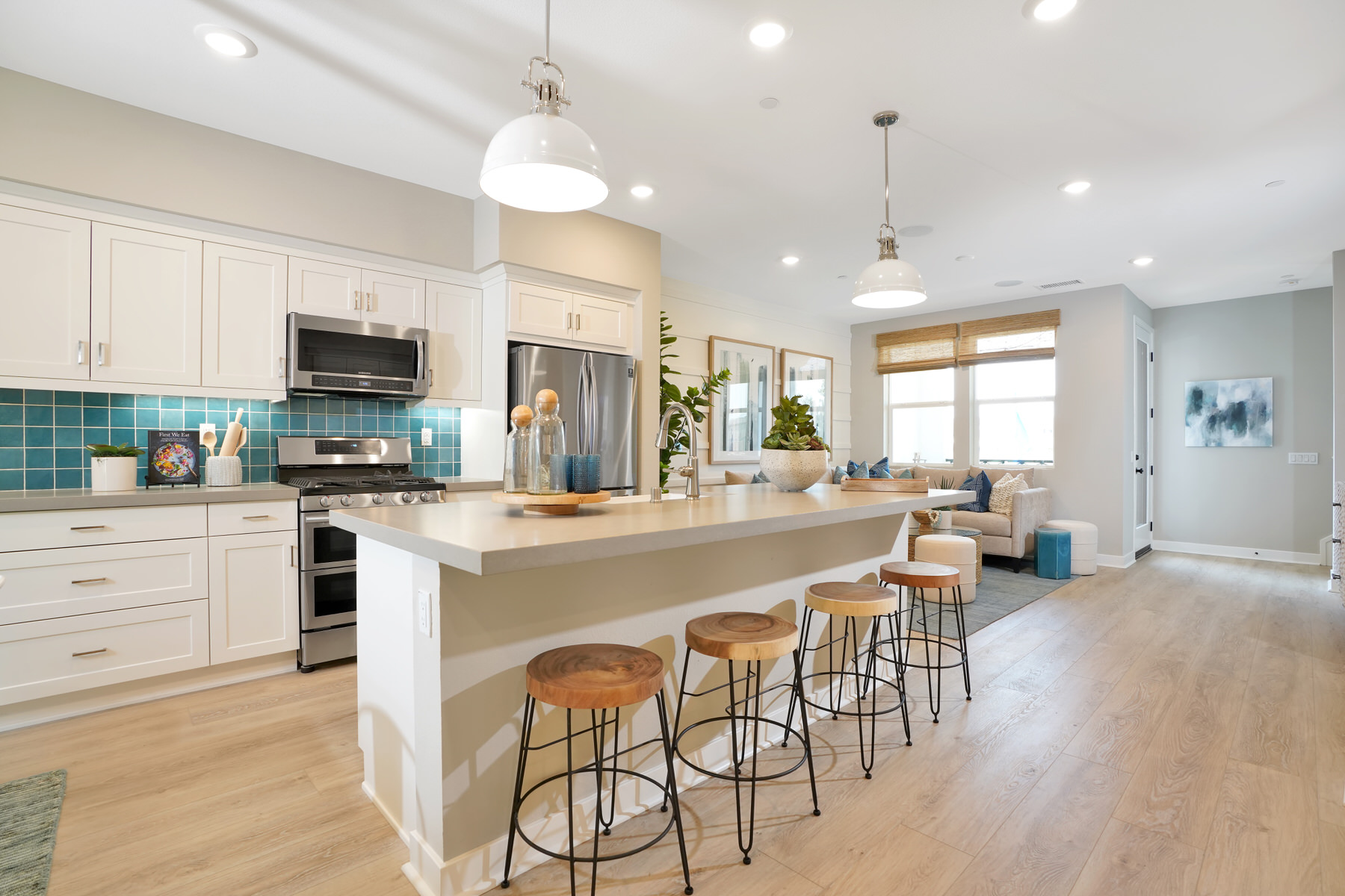 Kitchen/Living in Plan 2 at Townes at Magnolia by Melia Homes in Anaheim, CA
