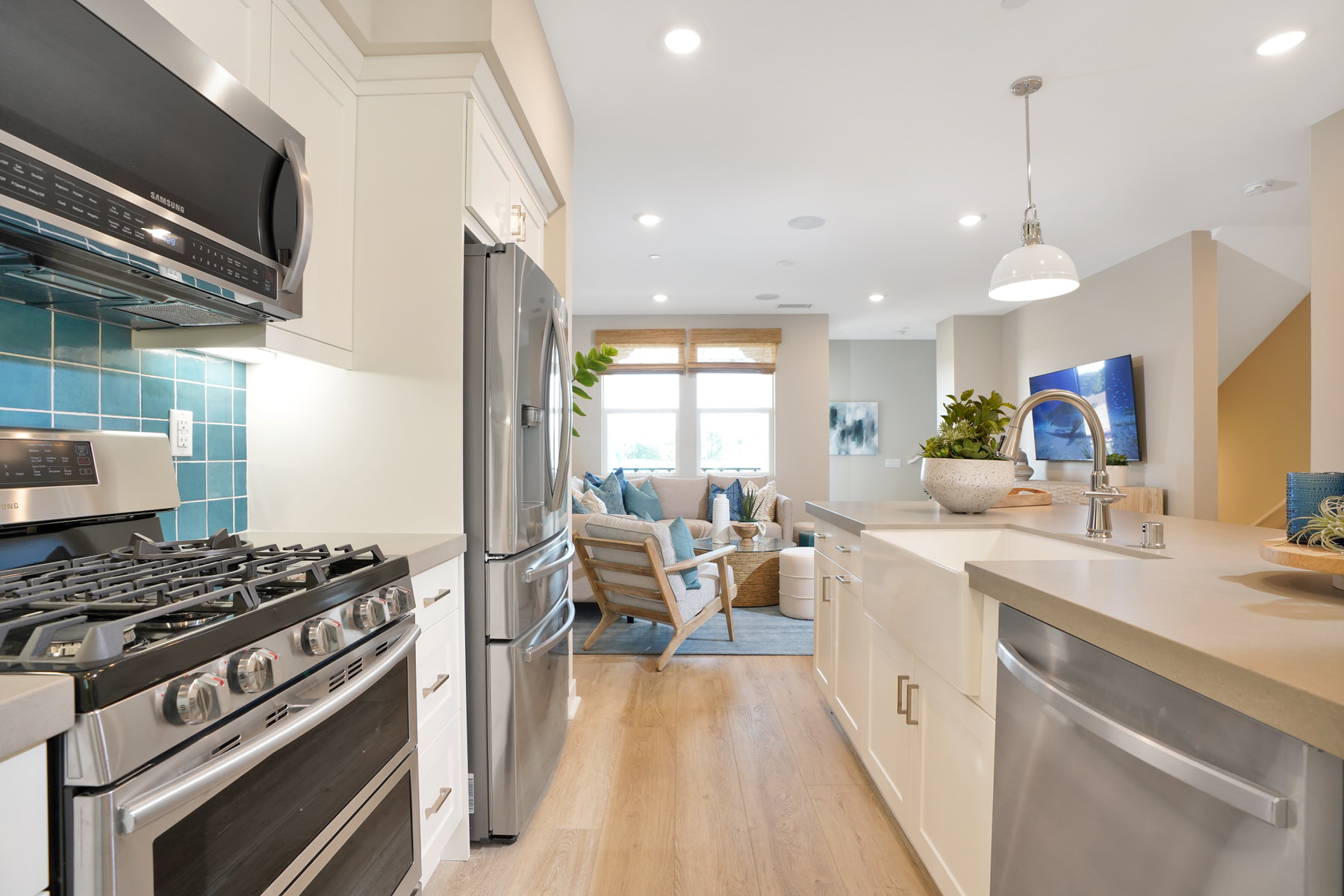 Kitchen/Living in Plan 2 at Townes at Magnolia by Melia Homes in Anaheim, CA