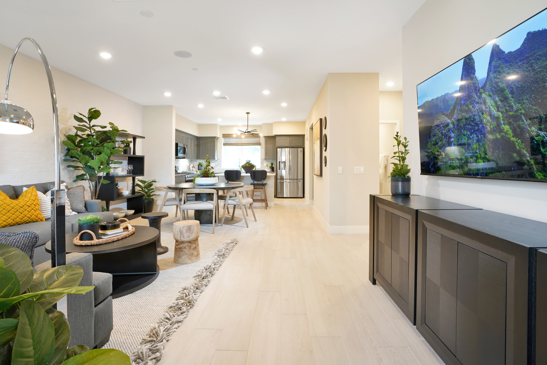 Living/Dining/Kitchen in Plan 3A at Townes at Magnolia by Melia Homes in Anaheim, CA