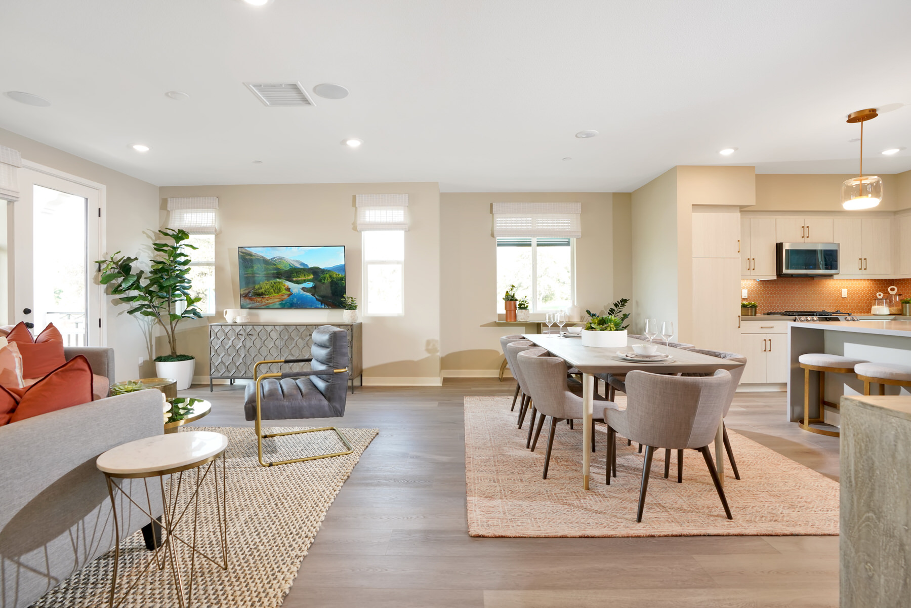 Living/Dining/Kitchen in Plan 4A at Townes at Magnolia by Melia Homes in Anaheim, CA
